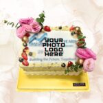 Flower with Berries and Gold Flakes [Corporate Event Photo Company Logo Cake]
